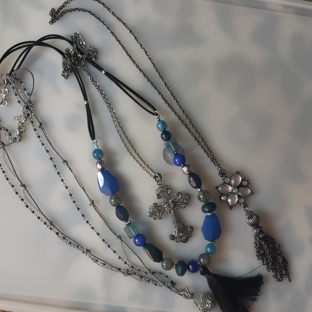 Lot of four long necklaces